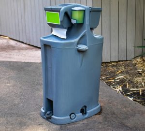 hand washing station next to a shed